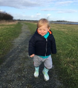 Taking a walk is a great way to entertain a toddler