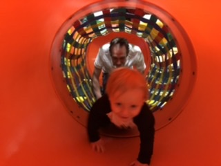 Robbie and Dad going through the maze of tunnels at Rascal Play in Clacton
